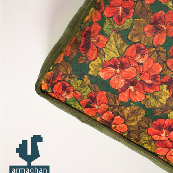 Floral-pillow-with-beautiful-red-flower-and-green-background