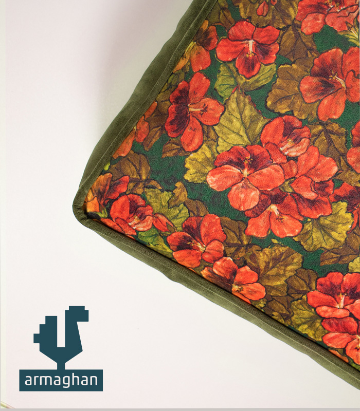Floral-pillow-with-beautiful-red-flower-and-green-background