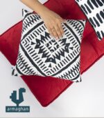 Red-stitched-cubic-pillow