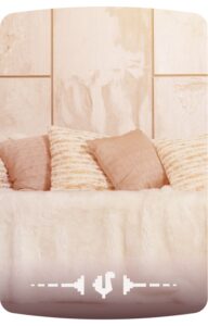 Peach cushions on the white sofa